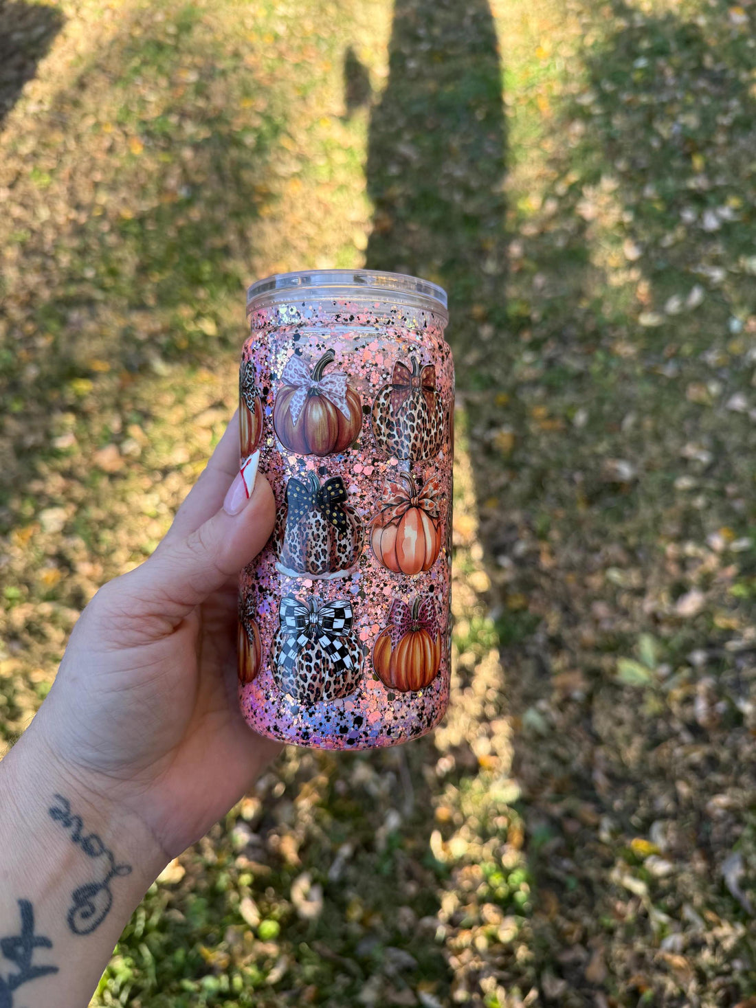 Snow Globe Tumbler: 16oz Acrylic Can with Orange Pumpkins