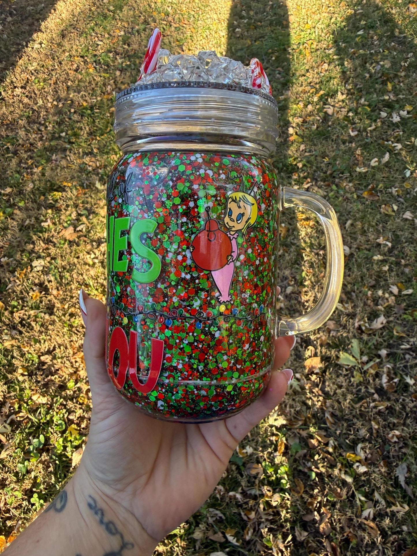 In a world full of grinches be a Cindy Lou 20oz mason jar snowglobe