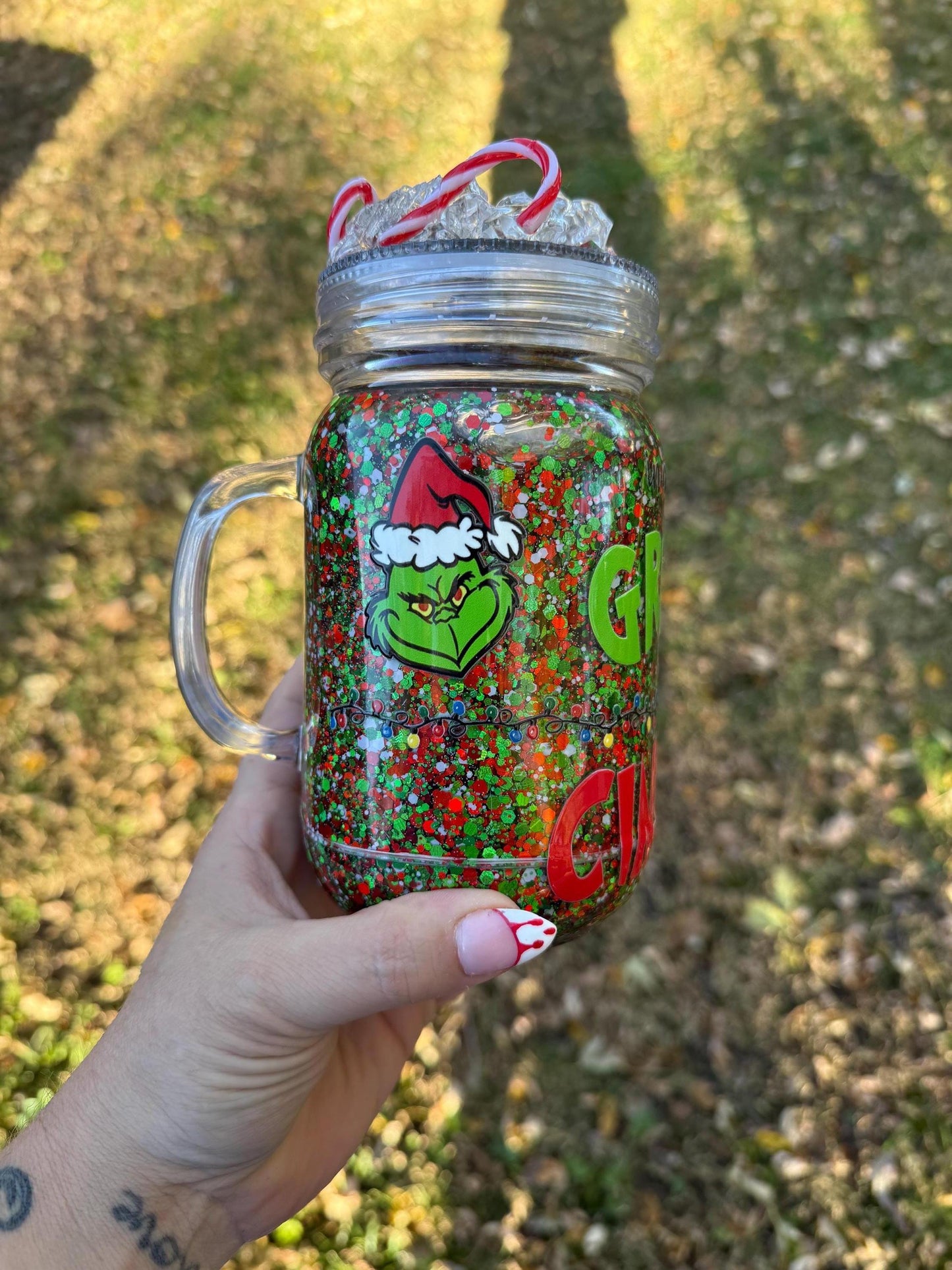 In a world full of grinches be a Cindy Lou 20oz mason jar snowglobe